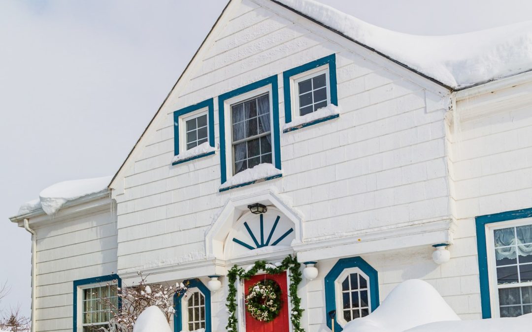 Old style north american family home after the snow storm